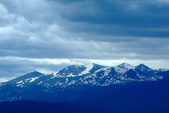 Snow-covered blue Rocky Mountain peaks • <a style="font-size:0.8em;" href="http://www.flickr.com/photos/34843984@N07/15358970318/" target="_blank">View on Flickr</a>