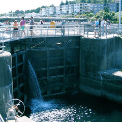 People crossing over the big Chittenden lock • <a style="font-size:0.8em;" href="http://www.flickr.com/photos/34843984@N07/15359804600/" target="_blank">View on Flickr</a>