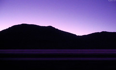 Dawnlight behind desert hills • <a style="font-size:0.8em;" href="http://www.flickr.com/photos/34843984@N07/15360071589/" target="_blank">View on Flickr</a>